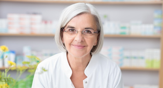 Friendly senior female pharmacist